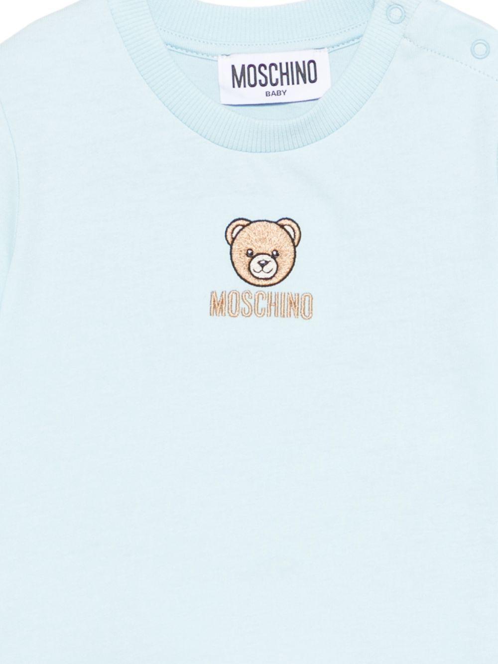T-shirt per neonati Moschino Kids azzurra con dettagli ricamati - Rubino Kids
