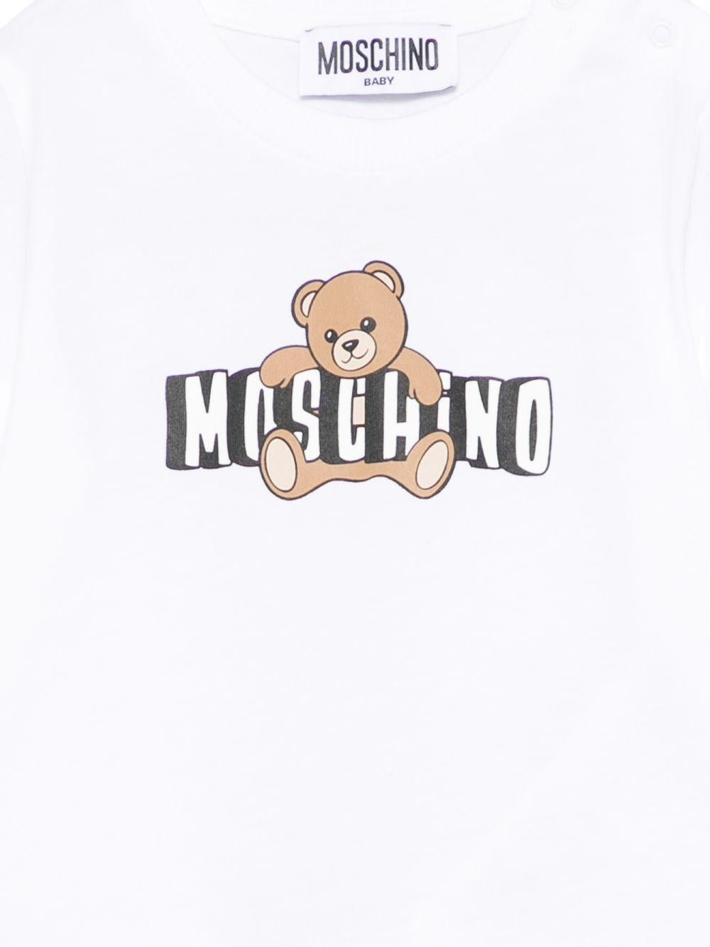 T-shirt per neonati Moschino Kids bianca con logo sul davanti - Rubino Kids
