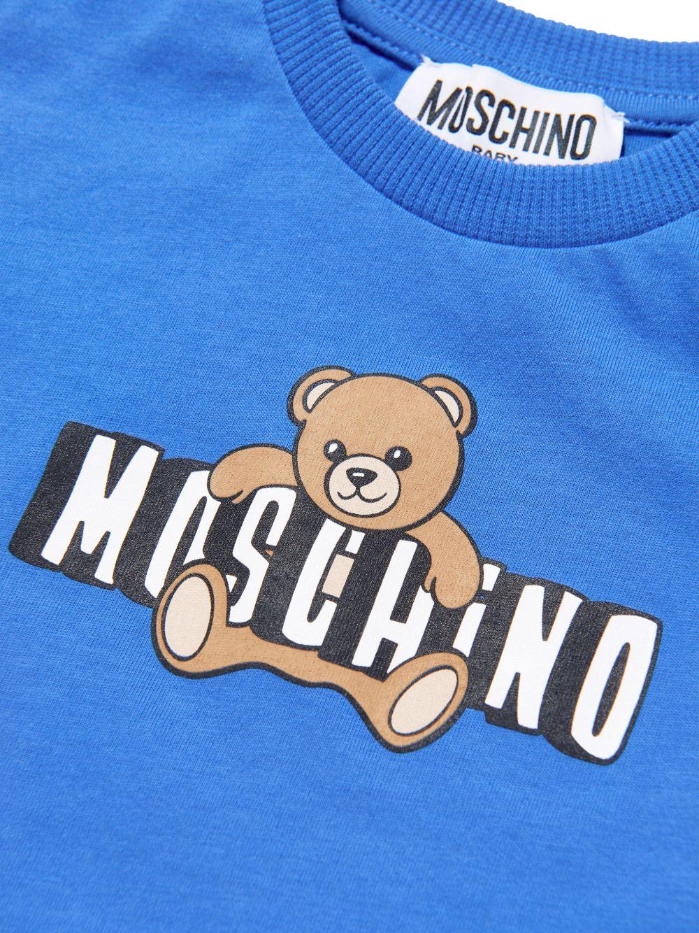 T-shirt per neonati Moschino Kids blu con logo sul davanti - Rubino Kids