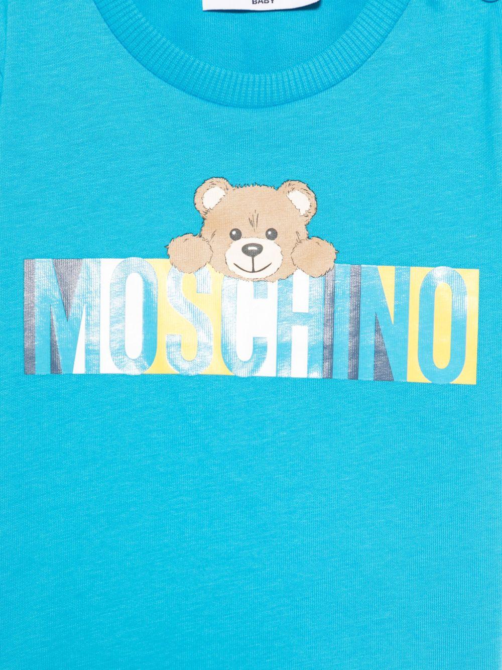 T-shirt per neonato Moschino Kids azzurro con stampa Teddy Bear - Rubino Kids