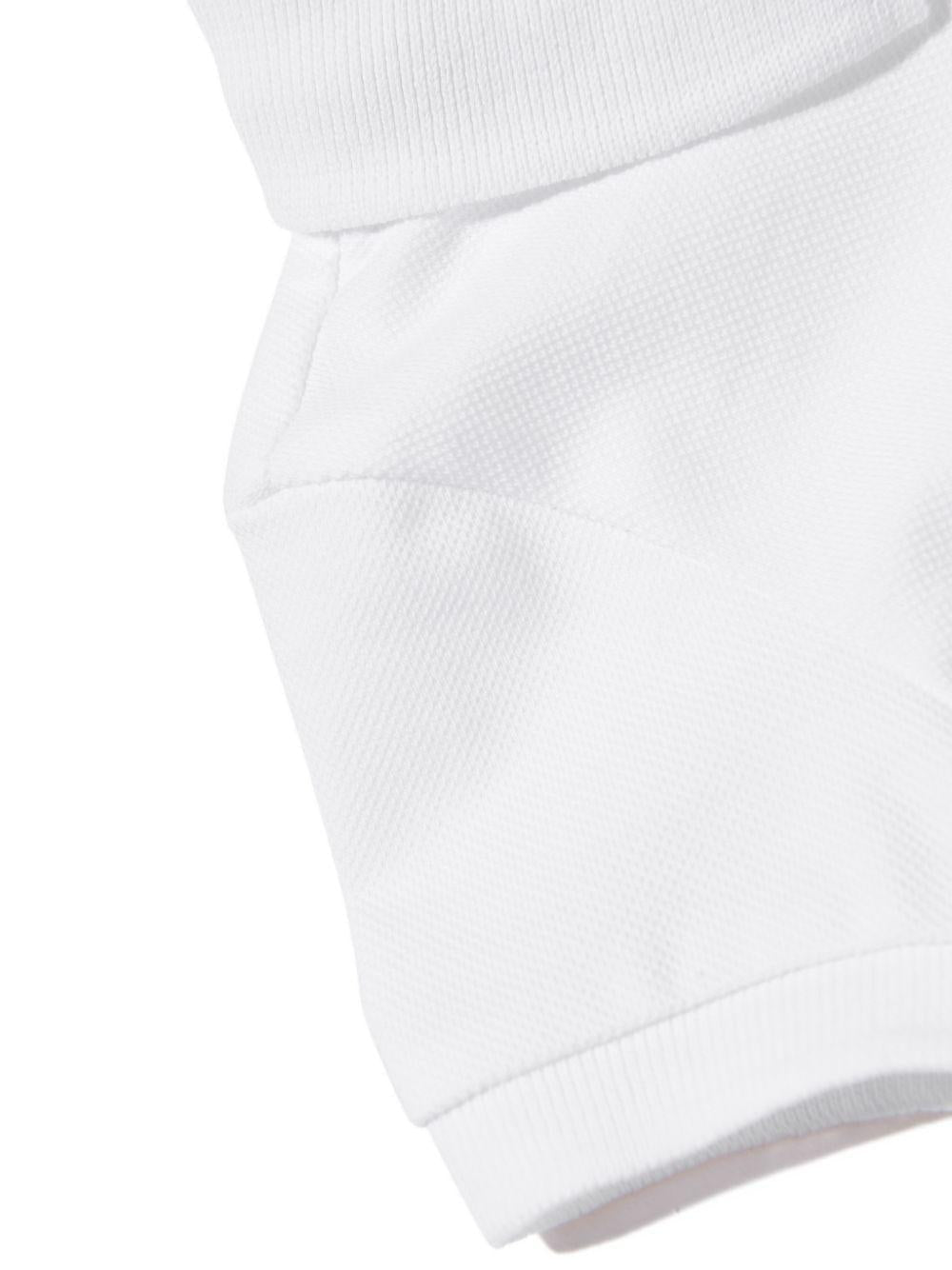 T-shirt per neonato Moschino Kids bianca con colletto stile polo - Rubino Kids