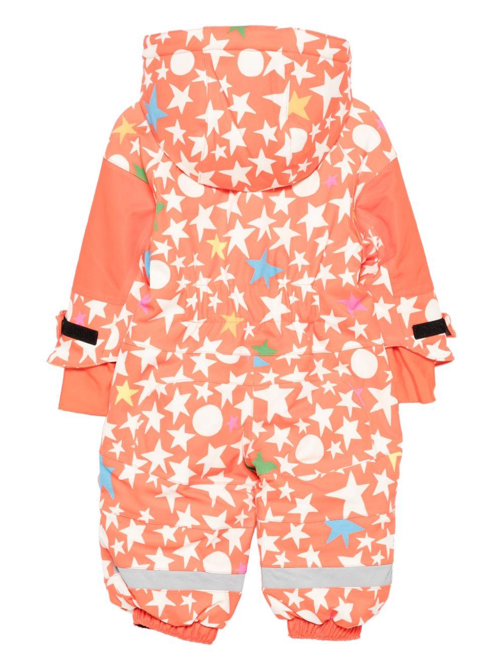 Tuta da neve per neonati Stella McCartney Kids arancione con motivo stelle - Rubino Kids