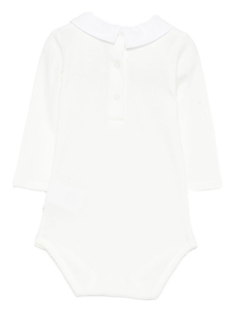 Tutina per neonati Bonpoint bianca con dettagli natalizi ricamati sul colletto - Rubino Kids