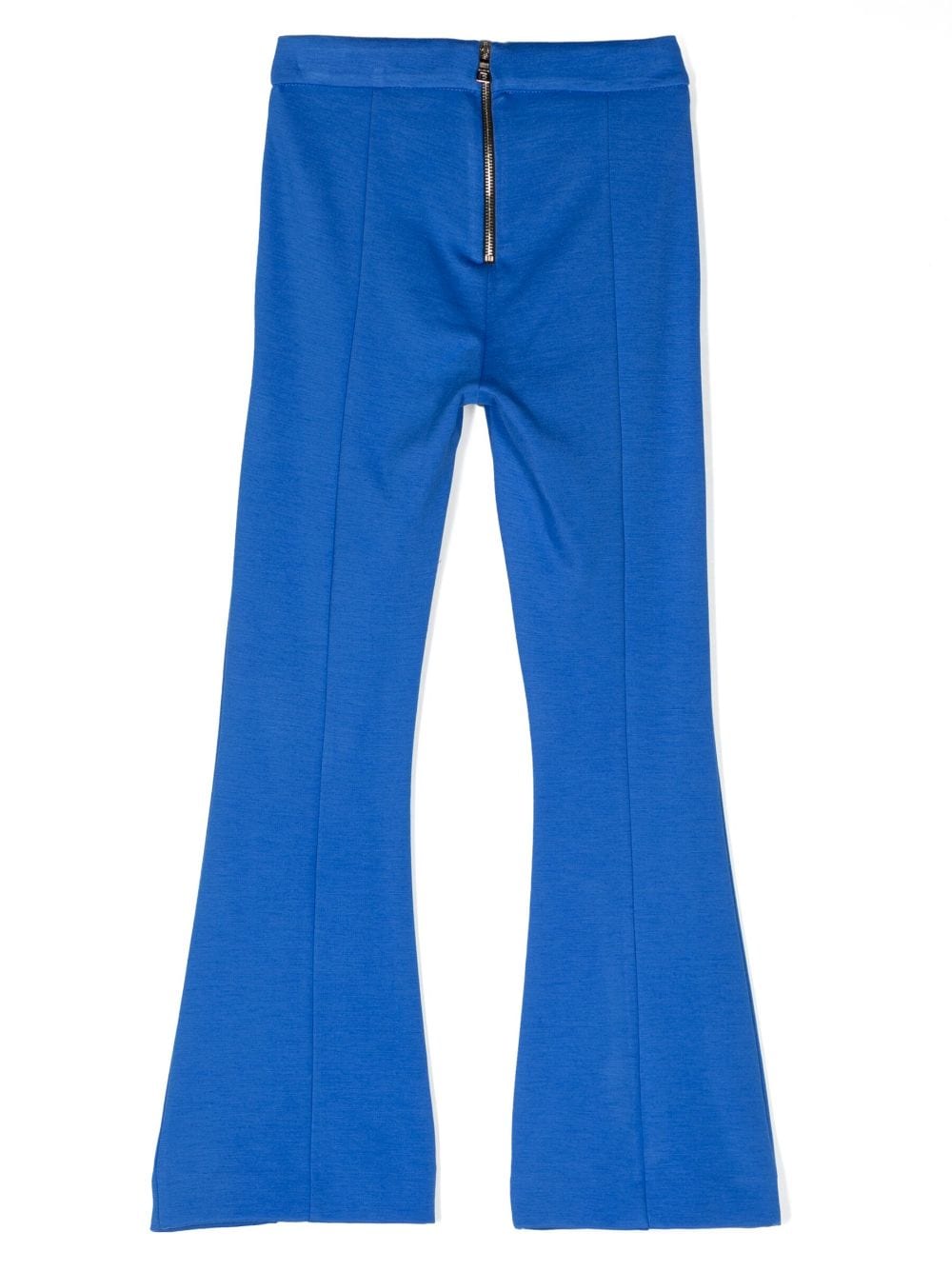 Flared trousers with decorative buttons