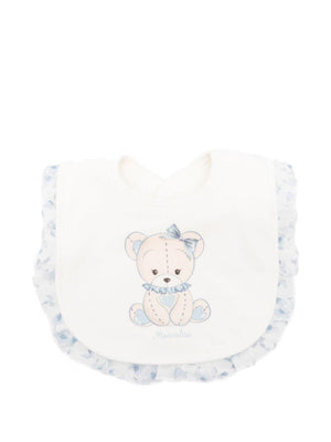 Monnalisa white baby bib with blue ruffle