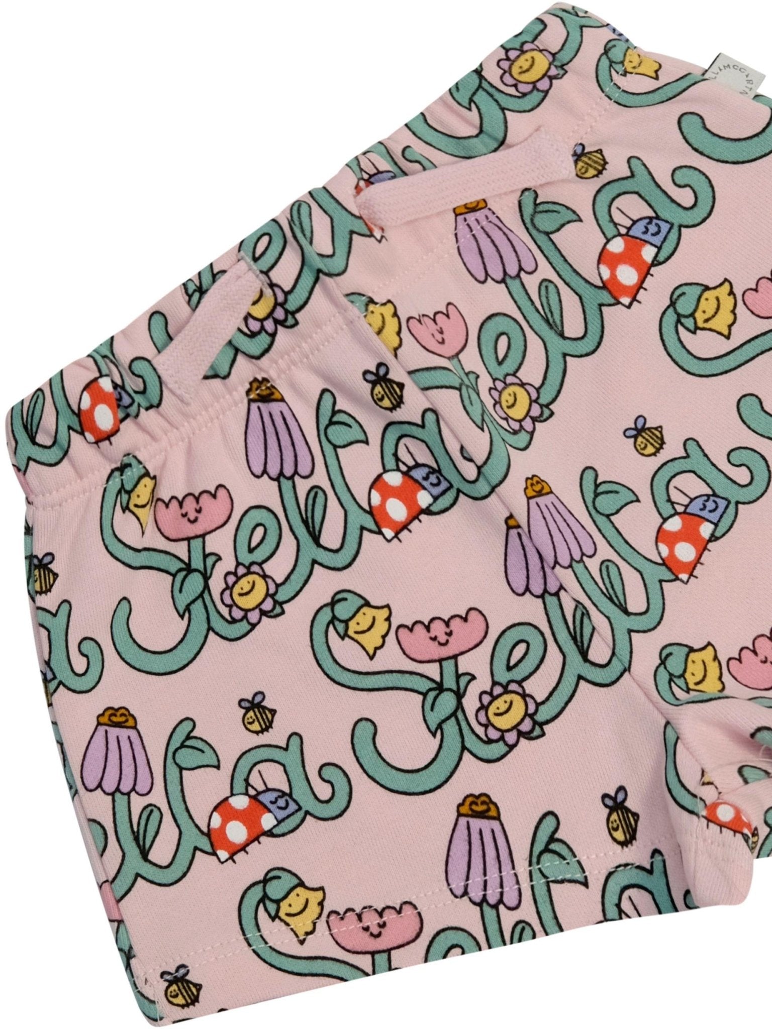Bermuda per bambina Stella McCartney Kids rosa con stampa grafica all - over - Rubino Kids