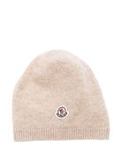Berretto per neonati Moncler Enfant beige con toppa con logo - Rubino Kids