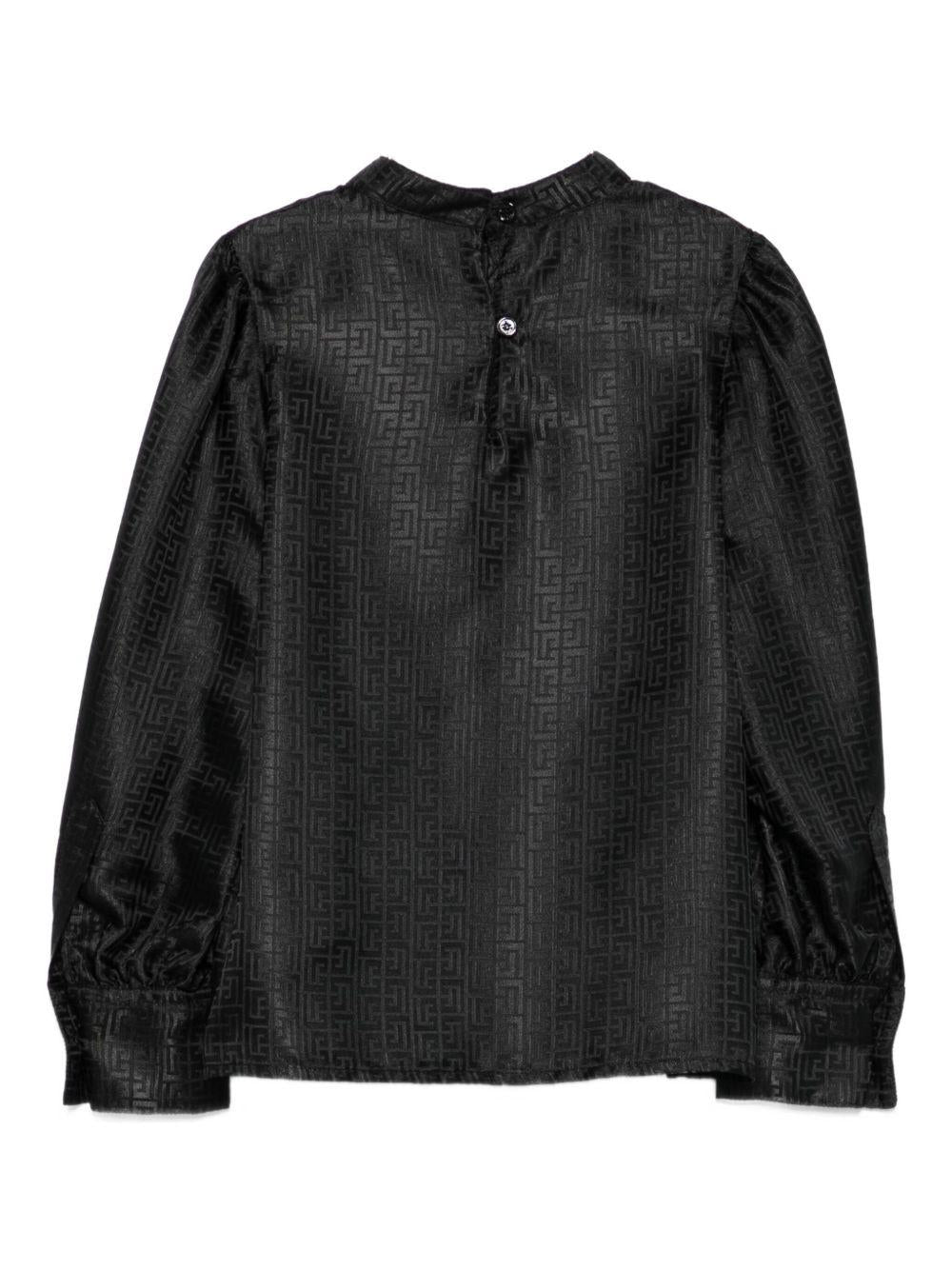 Blusa per bambina Balmain Kids nero con motivo geometrico e maniche a palloncino - Rubino Kids