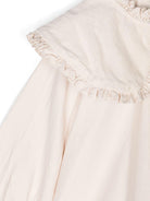 Blusa per bambina Donsje Mellys beige con dettagli ruches e colletto con pettorina - Rubino Kids