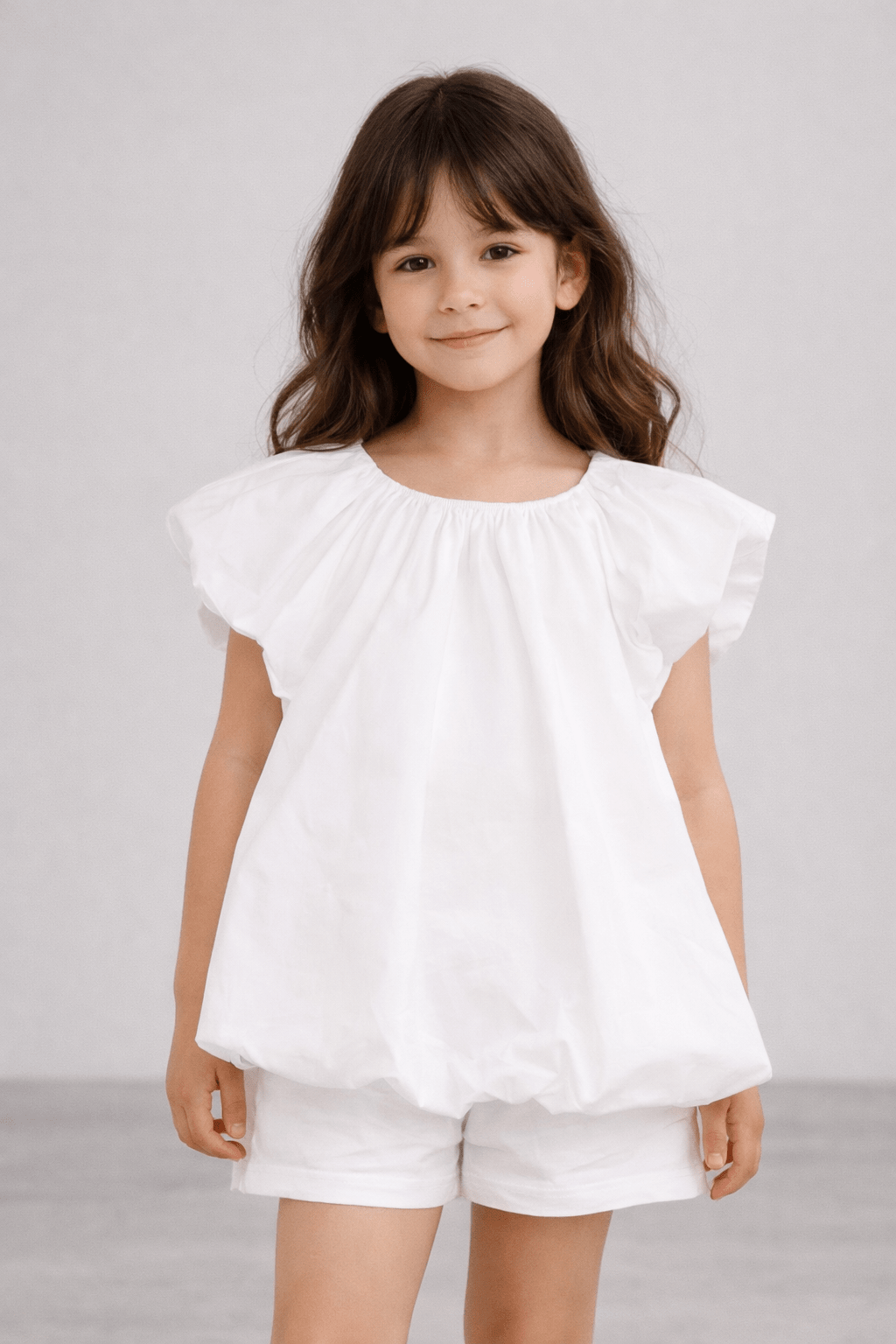 Blusa per bambina Stella McCartney Kids bianca con arricciatura - Rubino Kids