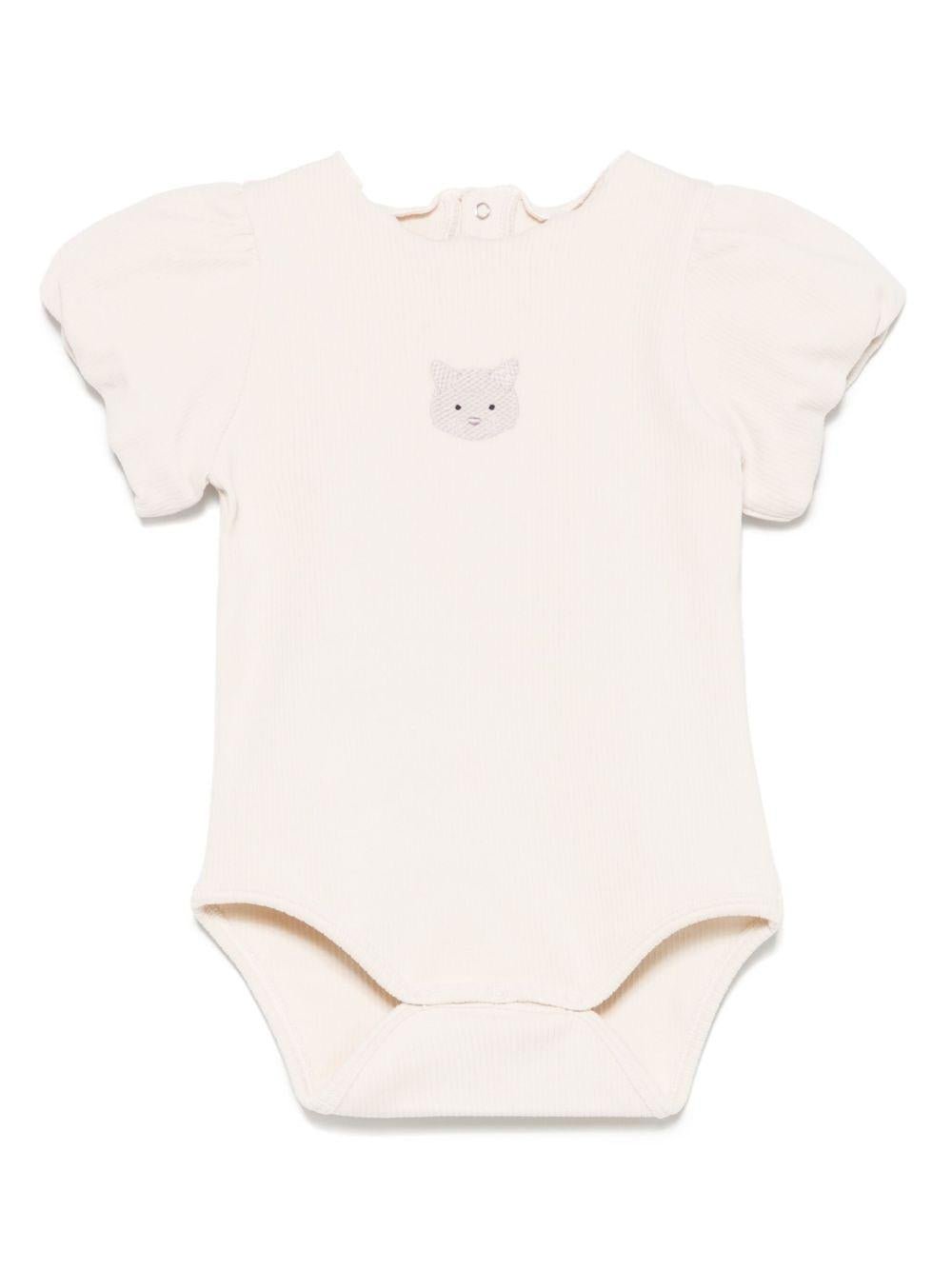 Body per neonata Donsje Nowie beige con motivo con ricamo - Rubino Kids
