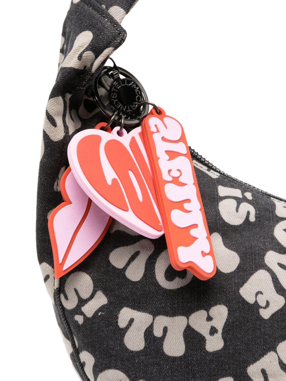 Borsa a mezzaluna per bambina Stella McCartney Kids nera con ciondolo a forma di labbra - Rubino Kids