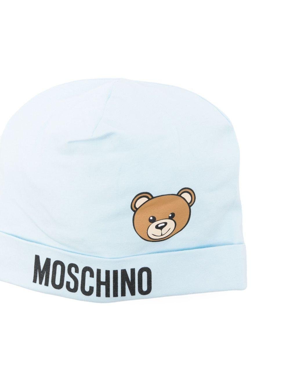 Cappello per neonato Moschino Kids azzurro con stampa logo e Teddy Bear - Rubino Kids