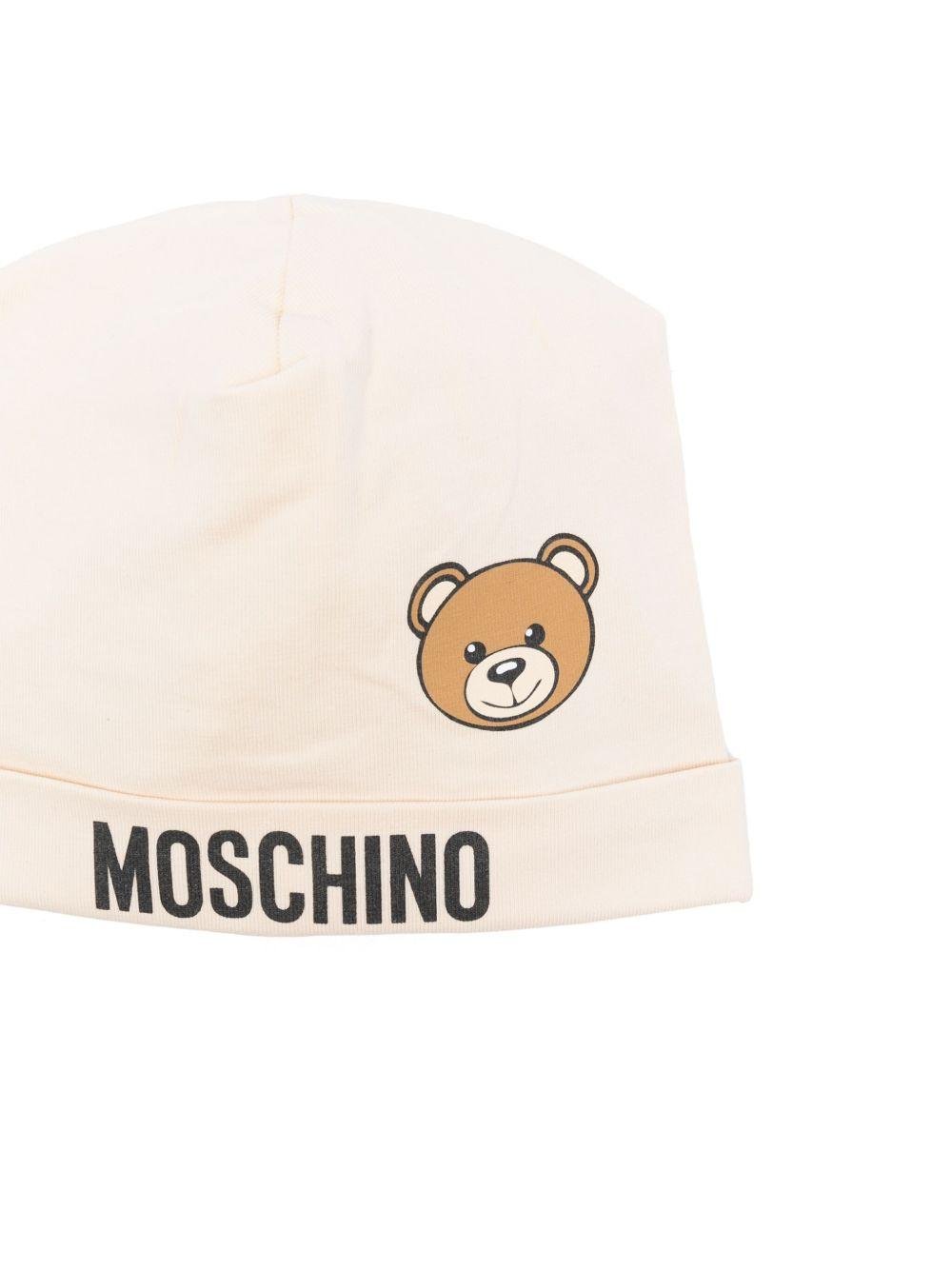 Cappello per neonato Moschino Kids beige con stampa logo e Teddy Bear - Rubino Kids