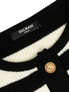 Cardigan a righe per bambina Balmain Kids bianca e nera con lavorazione in maglia - Rubino Kids
