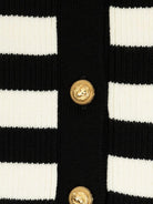 Cardigan a righe per bambina Balmain Kids bianca e nera con lavorazione in maglia - Rubino Kids