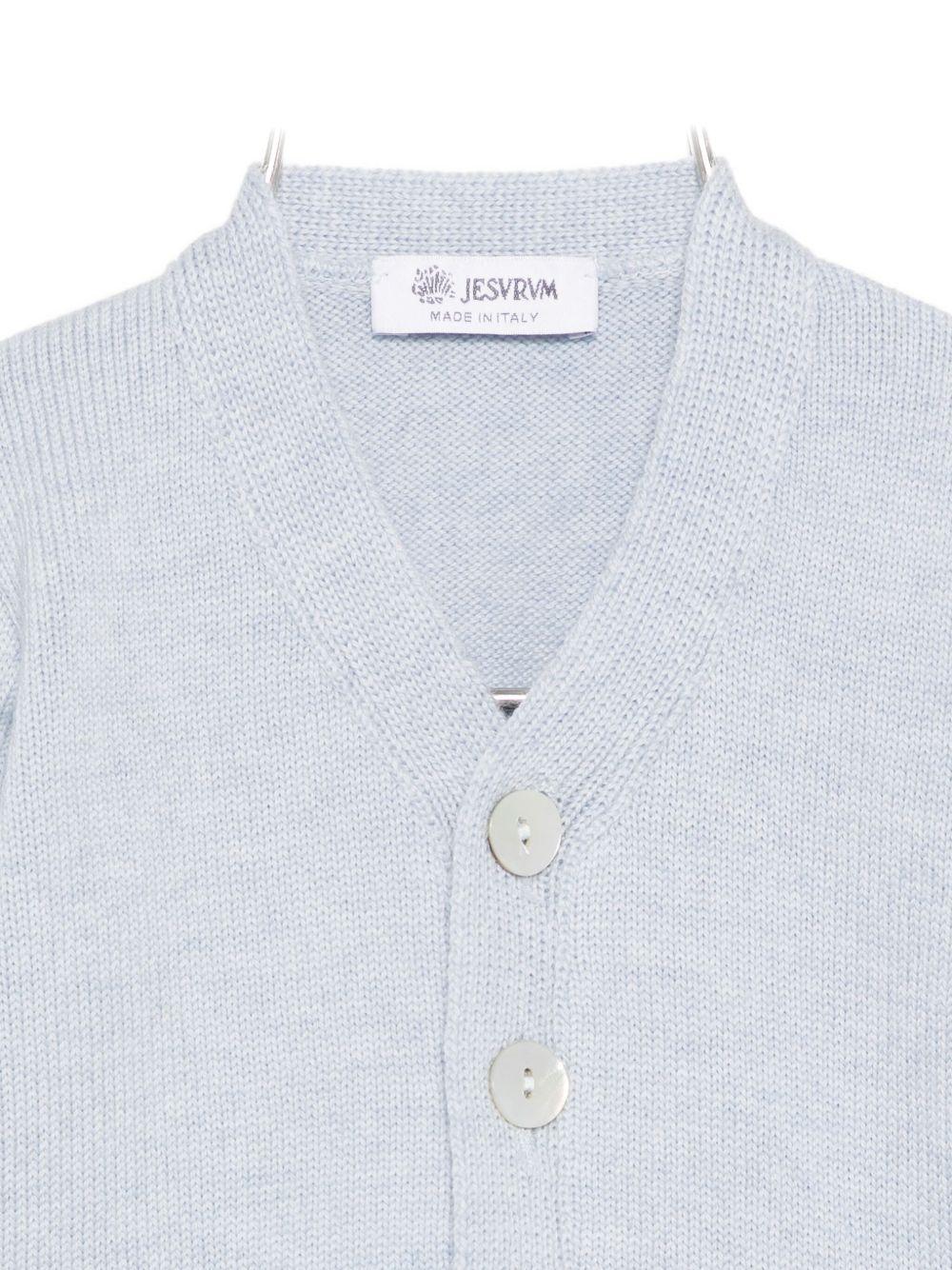 Cardigan per neonato Jesurum Baby azzurro con due tasche applicate sul davanti - Rubino Kids