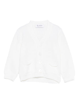 Jesurum Baby white cardigan for newborns with two patch pockets on the front