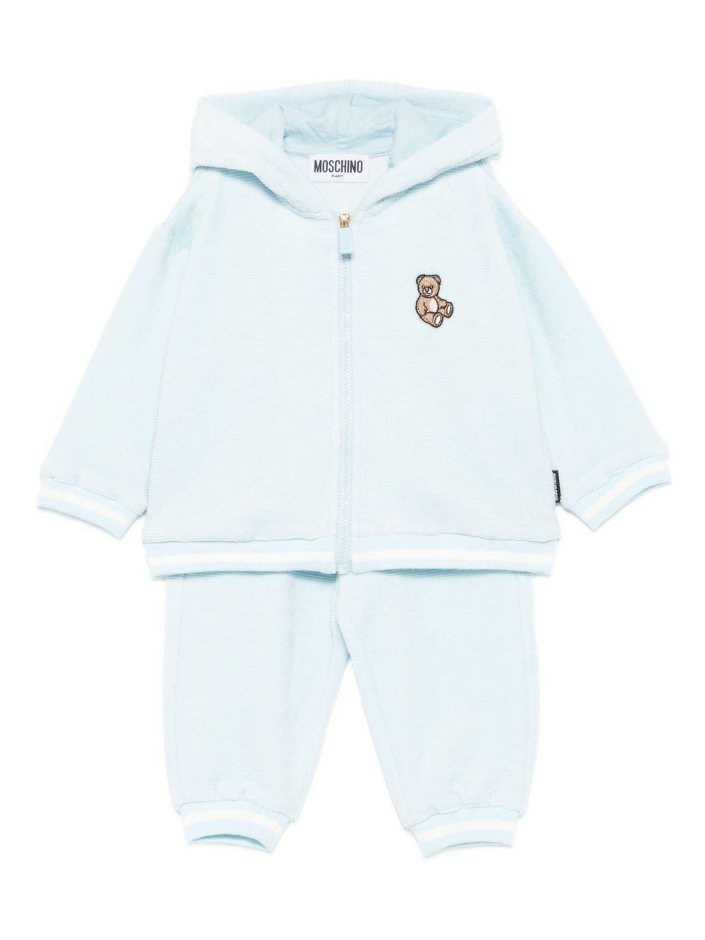 Completo felpa e pantaloni per neonato Moschino Kids azzurra con ricamo orsetto - Rubino Kids