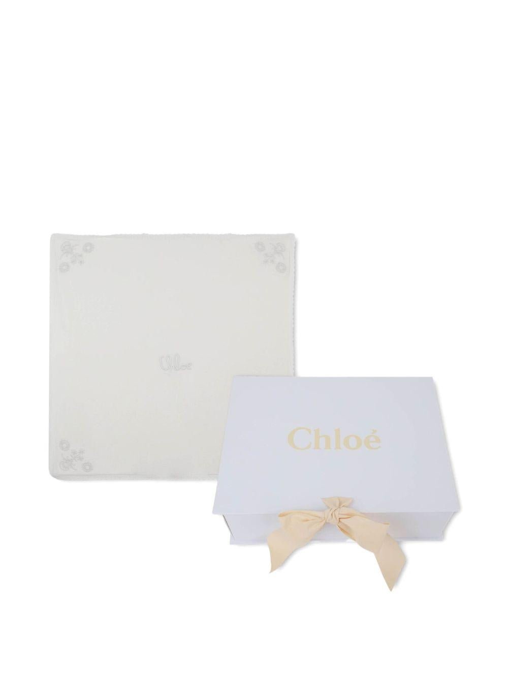 Coperta per neonata Chloé Kids bianca con ricamo a fiori - Rubino Kids