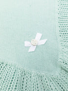 Coperta per neonati Paz Rodriguez verde con dettaglio fiocco - Rubino Kids