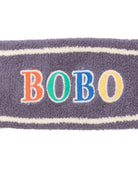 Fascia per bambina Bobo Choses viola con strisce ricamate - Rubino Kids