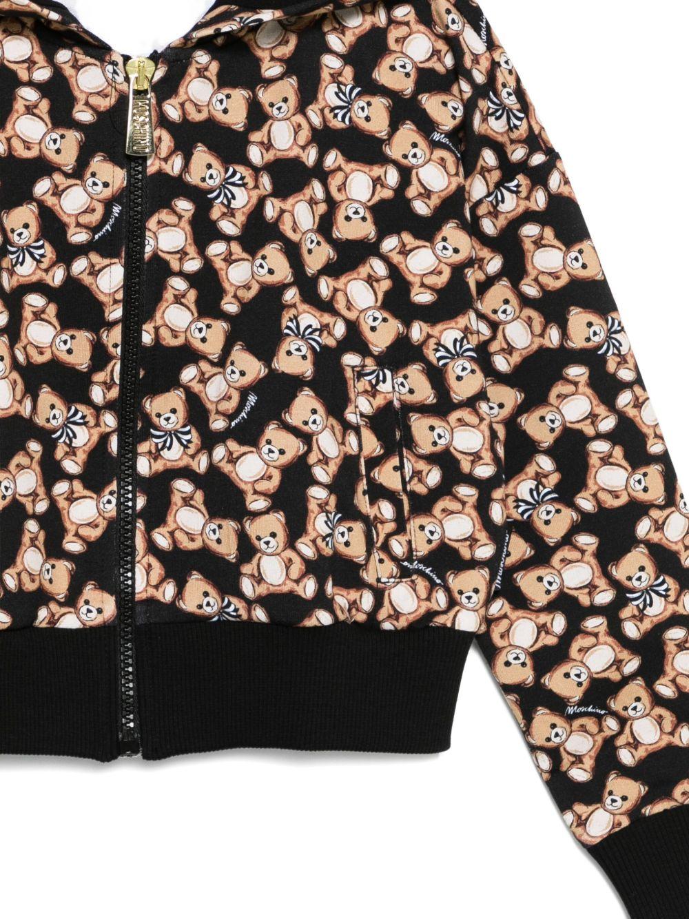 Felpa per bambina Moschino Kids nera con stampa all - over - Rubino Kids