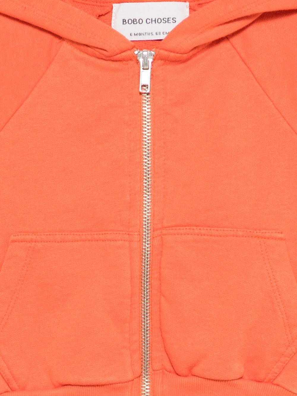 Felpa per neonato Bobo Choses arancione con logo sulla manica a contrasto - Rubino Kids