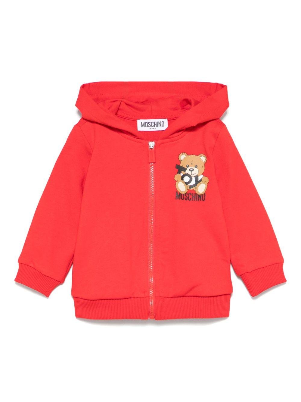 Felpa Teddy Bear con cappuccio per neonato Moschino Kids rosso con due tasche laterali - Rubino Kids