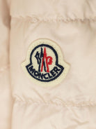 Giacca imbottita per neonata Moncler Enfant rosa con due tasche laterali oblique - Rubino Kids