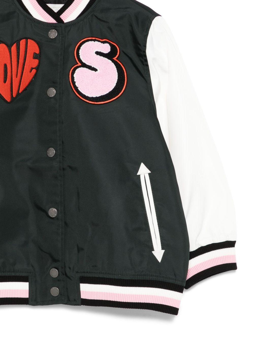 Giacca per bambina Stella McCartney Kids varsity Love nero con applicazioni - Rubino Kids