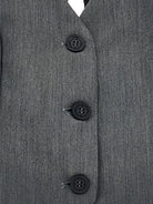 Gilet per bambina Monnalisa grigio con scollo all'americana con nodo - Rubino Kids