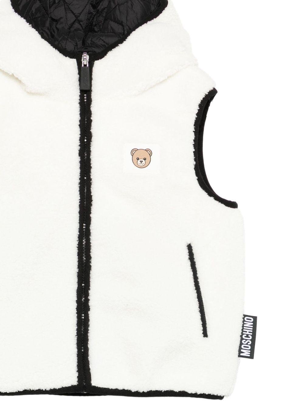 Gilet per bambini Moschino Kids bianco con applicazione Teddy - Rubino Kids