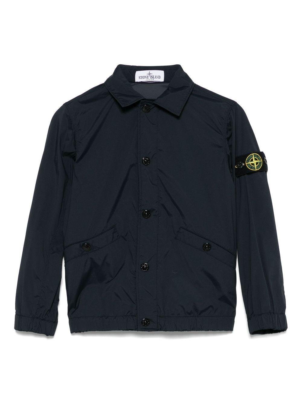 Giubbino con applicazione Compass per bambino Stone Island Junior blu con colletto classico - Rubino Kids