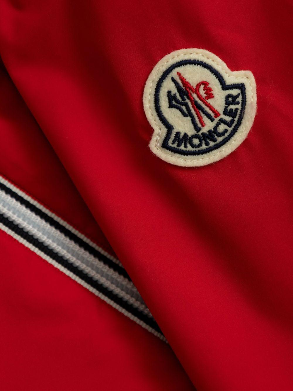 Giubbino per bambino Moncler Enfant rosso reversibile con cappuccio e orli elasticizzati - Rubino Kids