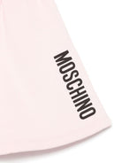Gonna con logo per bambina Moschino Kids rosa con due tasche laterali - Rubino Kids