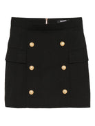 Gonna per bambina Balmain Kids nera con bottoni oro e tasche ad aletta - Rubino Kids