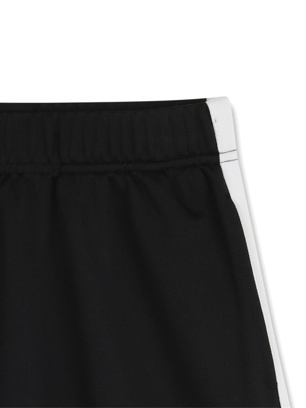 Gonna per bambina Kenzo Kids nera con dettaglio bande laterali - Rubino Kids