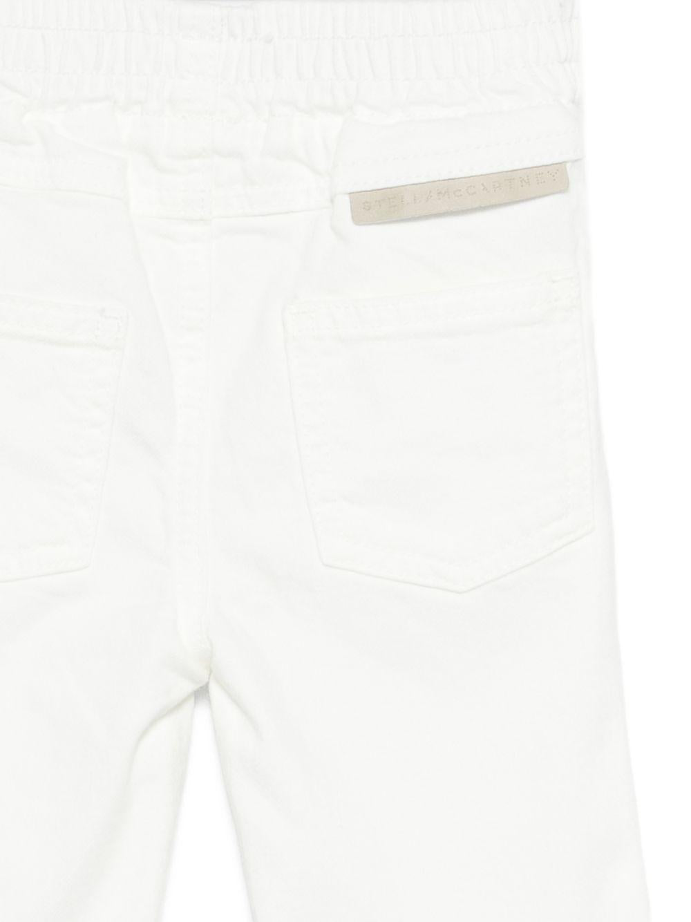 Jeans per neonato Stella McCartney Kids bianchi elasticizzati TY6150 Z0156 101 STELLA McCARTNEY KIDS 