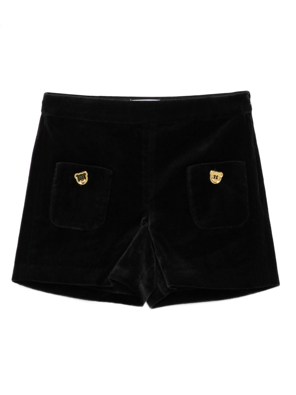 Shorts per bambina Moschino Kids nera con bottoni color oro HDQ01VLWA07 60100 MOSCHINO KIDS 