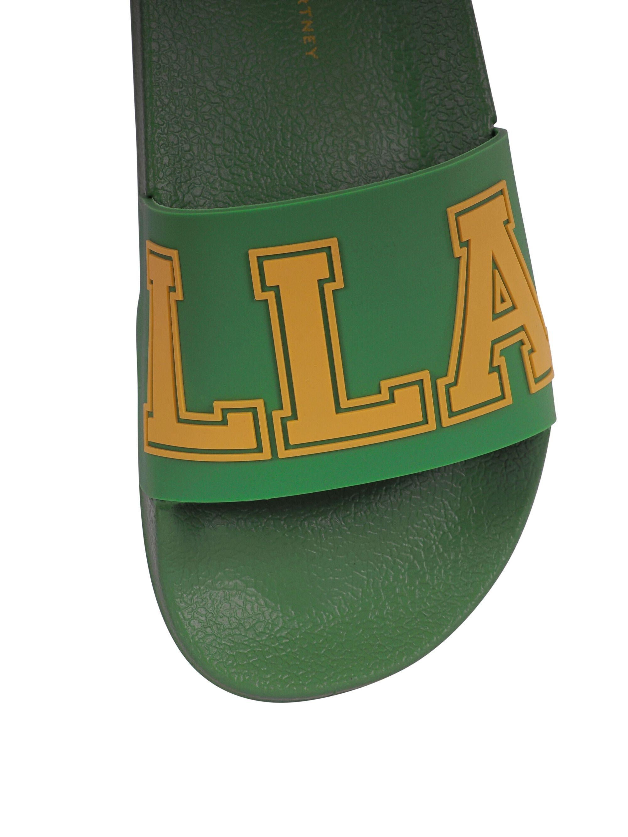 Ciabatte per bambino Stella McCartney Kids verdi con scritta Stella TY0Q26 Z2951 769 STELLA McCARTNEY KIDS 