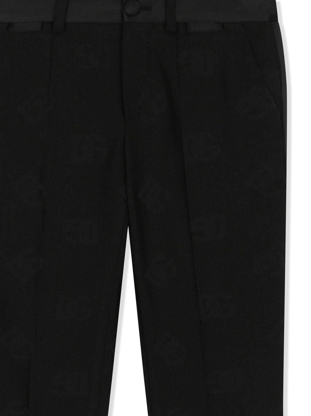 Pantaloni per bambino Dolce & Gabbana Kids nero con logo DG jacquard L44P04 FJBAK N0000 DOLCE & GABBANA KIDS 