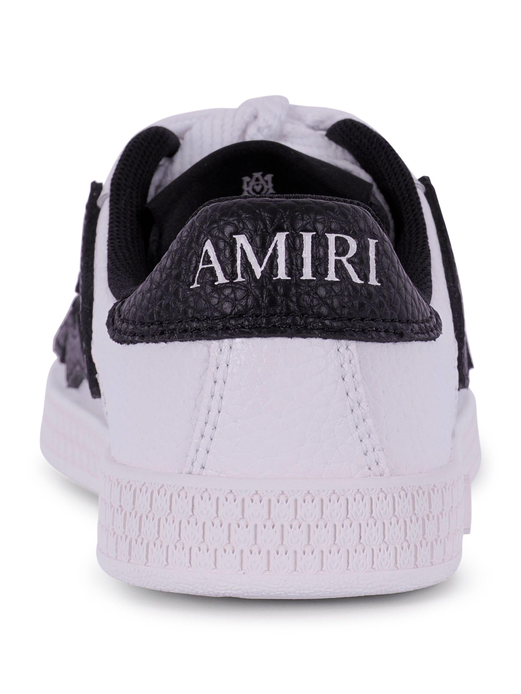 Sneakers Pacific Bones per bambino Amiri Kids bianche e nere con suola in rilievo ACSNSN1006 001 AMIRI 