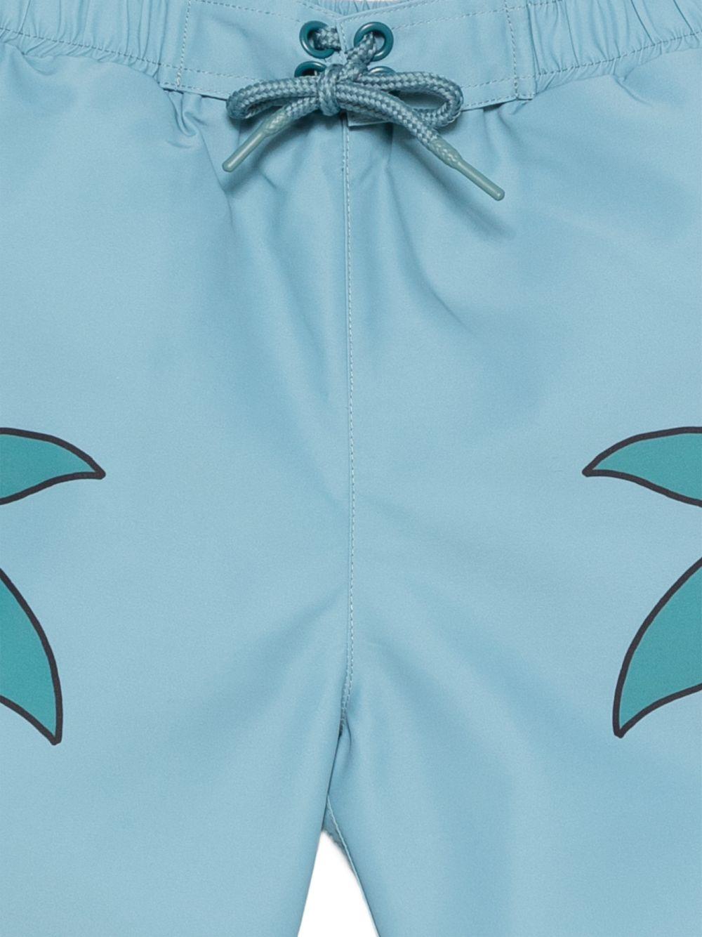 Costumi per bambino Stella McCartney Kids azzurro con grafica balene TYCP69 Z0433 642 STELLA McCARTNEY KIDS 