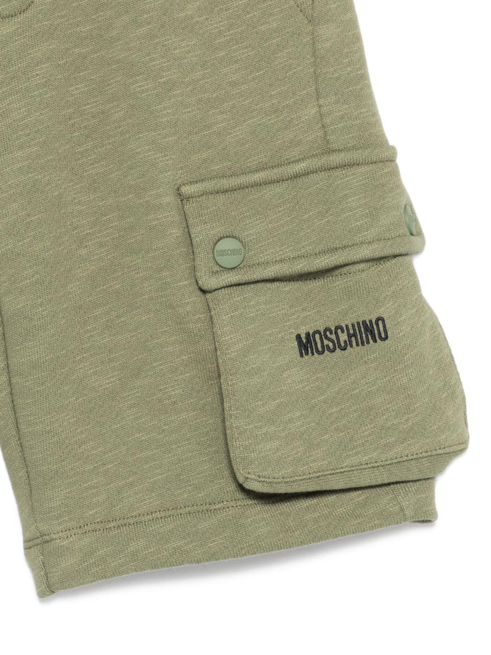 Shorts per bambino Moschino Kids verde con logo sul davanti HUQ02QLCA88 30037 MOSCHINO KIDS 