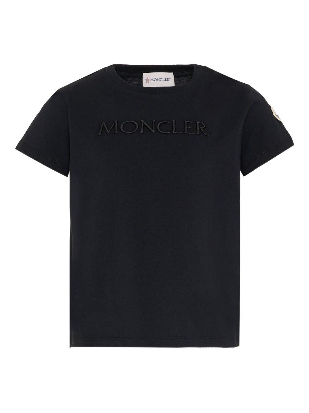 T-shirt per bambino Moncler Enfant nera con logo goffrato L19548C0000989AT9 999 MONCLER ENFANT 