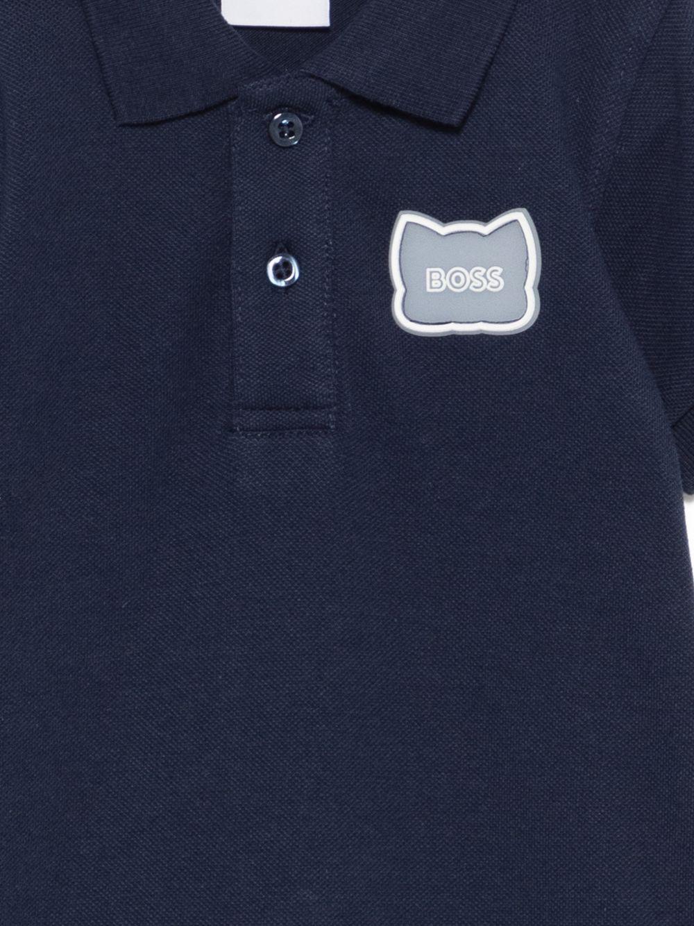 Tutina per neonato Boss Kids blu con dettaglio applicato J53033 849 BOSS KIDS 