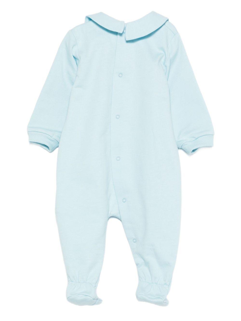 Tutina per neonato Moschino Kids azzurra con motivo Teddy Bear MUY08JLCA40 40304 MOSCHINO KIDS 