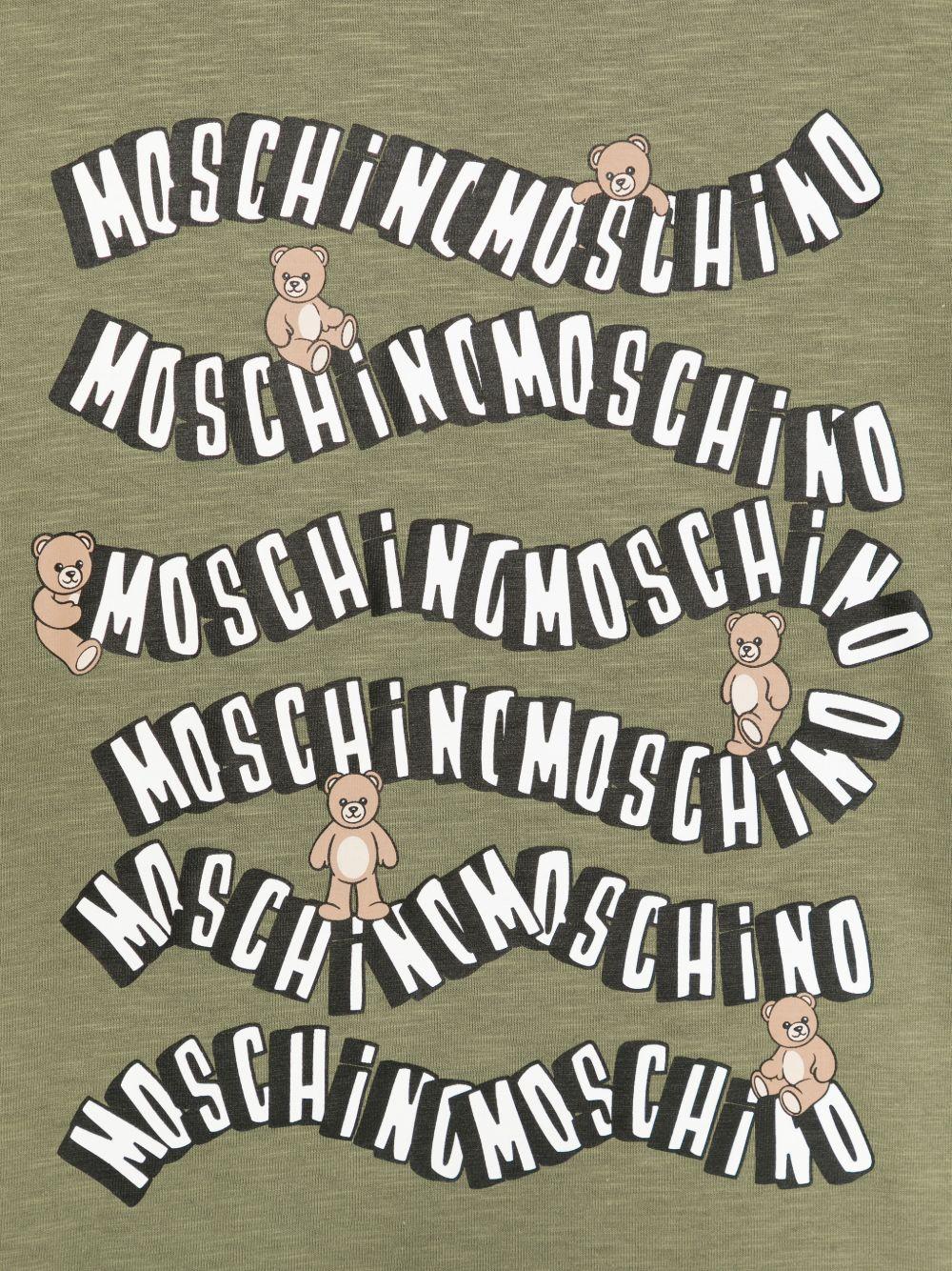 T-shirt per bambini Moschino Kids verde con stampa logo ondulata HXM05GLAA52 30037 MOSCHINO KIDS 
