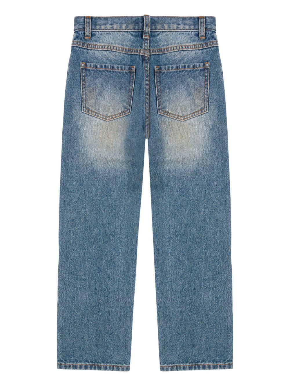 Jeans dritti per bambina Moschino Kids denim con design patchwork - Rubino Kids